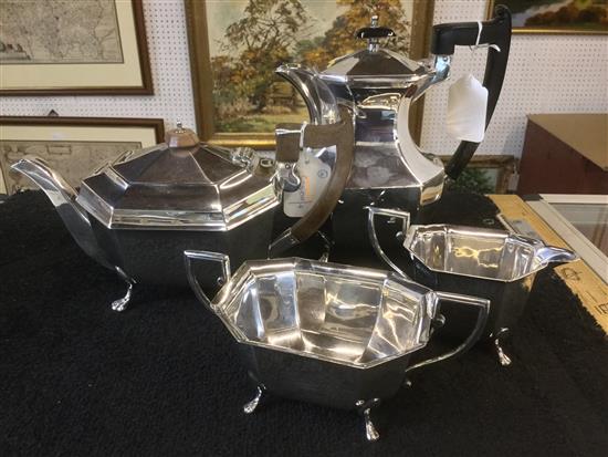 Silver three-piece teaset (Thomas Turner & Co) with matched plated hot water pot